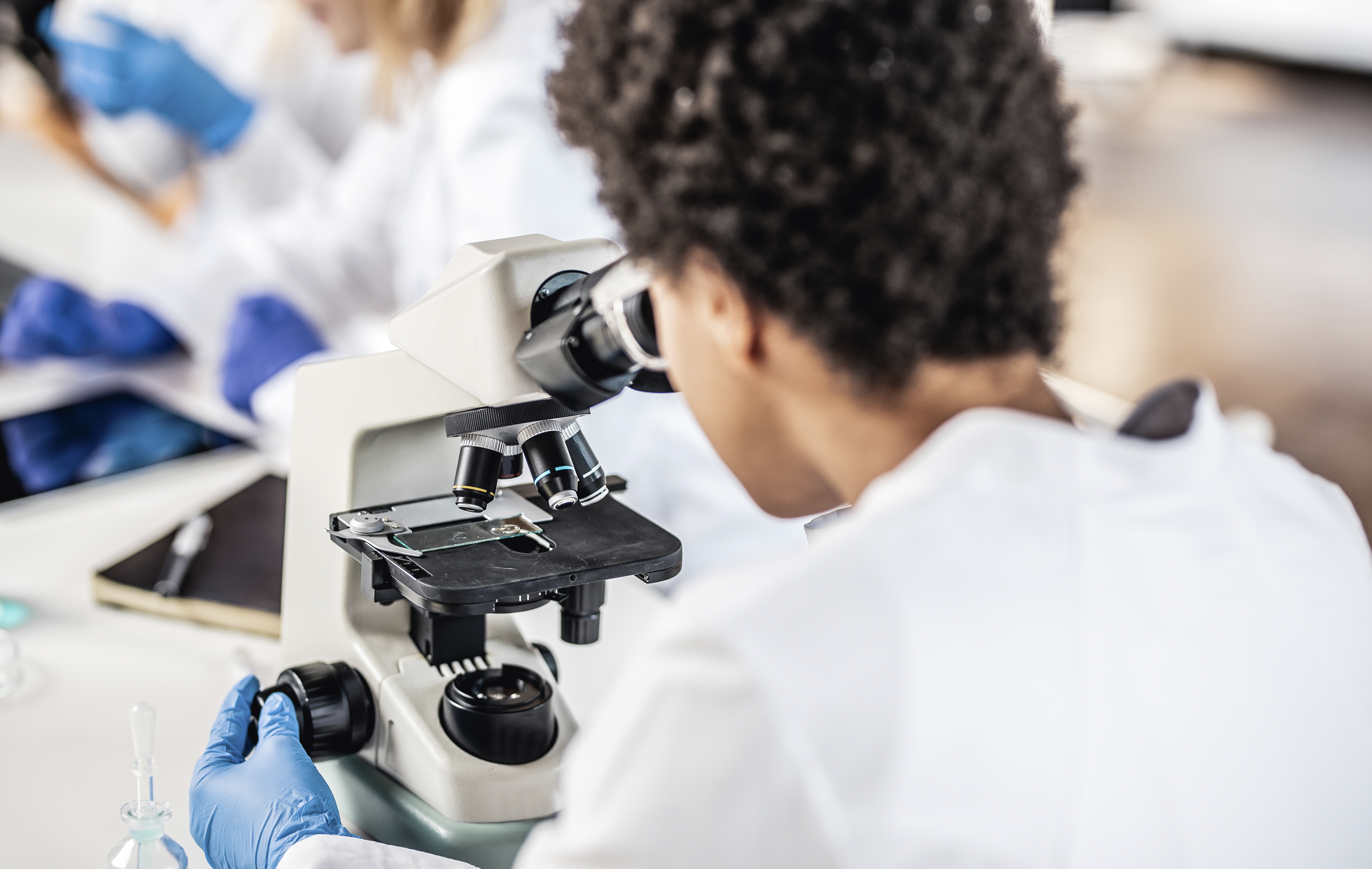 Scientist with Microscope